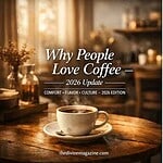 Freshly brewed coffee in a cozy café setting with coffee beans and brewing equipment.