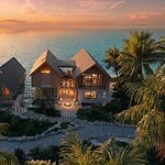 Overwater villa in Belize with Maldives-style design and stunning ocean views.