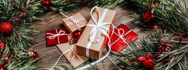 christmas gifts with decorations on the table